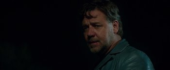 Movie still from “The Nice Guys” (2016), directed by Shane Black – A person wearing a shirt; Close Up shot, Low angle