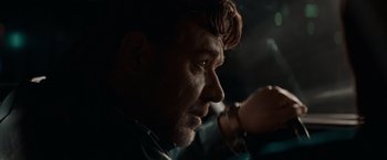 Movie still from “The Nice Guys” (2016), directed by Shane Black – A person drinking from a cup; Close Up shot, Low angle