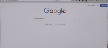 Movie still from “The Night Agent” (2023), created by Shawn Ryan – A computer screen showing the google search page; Extreme Close Up shot, Low angle