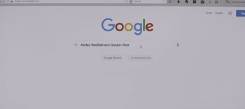 Movie still from “The Night Agent” (2023), created by Shawn Ryan – A computer screen with the google logo on it; Extreme Close Up shot, High angle