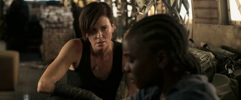 Movie still from “The Old Guard” (2020), directed by Gina Prince-Bythewood – Close Up shot, Over the shoulder angle