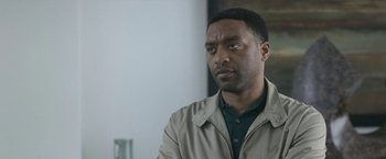 Movie still from “The Old Guard” (2020), directed by Gina Prince-Bythewood – Close Up shot, Over the shoulder angle