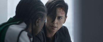 Movie still from “The Old Guard” (2020), directed by Gina Prince-Bythewood – Close Up shot, Over the shoulder angle