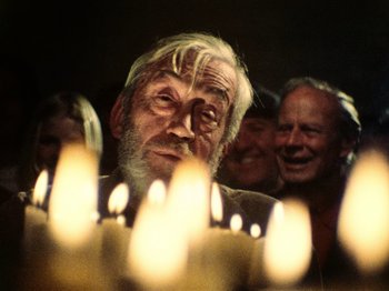 Movie still from “The Other Side of the Wind” (2018), directed by Orson Welles – An old man with white hair and a white beard; Close Up shot, Low angle