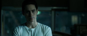 Movie still from “The Outsider” (2018), directed by Martin Zandvliet – A person wearing a white t - shirt; Close Up shot, Over the shoulder angle