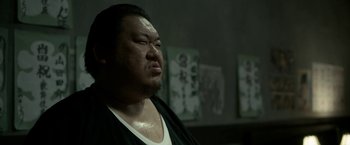 Movie still from “The Outsider” (2018), directed by Martin Zandvliet – A person wearing a black shirt; Close Up shot, Low angle