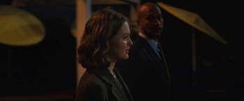 Movie still from “The Prom” (2020), directed by Ryan Murphy – A man and a woman standing next to each other in the dark; Close Up shot, Over the shoulder angle