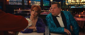 Movie still from “The Prom” (2020), directed by Ryan Murphy – A woman and a man sitting at a table in a restaurant; Medium shot, Over the shoulder angle