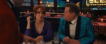 Movie still from “The Prom” (2020), directed by Ryan Murphy – A man and a woman sitting at a table in front of each other; Medium shot, Over the shoulder angle
