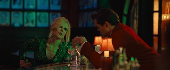 Movie still from “The Prom” (2020), directed by Ryan Murphy – A man and a woman sitting at a table; Medium shot, Over the shoulder angle