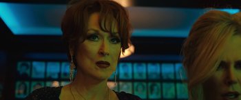 Movie still from “The Prom” (2020), directed by Ryan Murphy – A person wearing a dress; Close Up shot, Over the shoulder angle