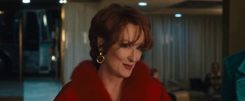 Movie still from “The Prom” (2020), directed by Ryan Murphy – A person wearing a red jacket; Close Up shot, Over the shoulder angle