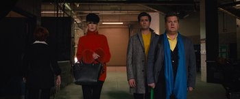 Movie still from “The Prom” (2020), directed by Ryan Murphy – A group of people standing in a parking garage; Medium shot, Over the shoulder angle