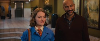 Movie still from “The Prom” (2020), directed by Ryan Murphy – A man and a woman standing next to each other; Medium shot, Over the shoulder angle