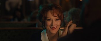 Movie still from “The Prom” (2020), directed by Ryan Murphy – A person with short red hair; Close Up shot, Over the shoulder angle
