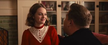 Movie still from “The Prom” (2020), directed by Ryan Murphy – A woman in a red dress and a man in a black shirt; Medium shot, Over the shoulder angle