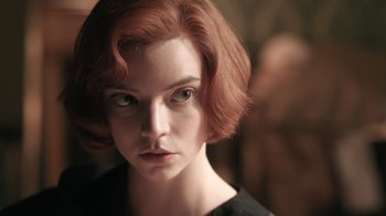 Movie still from “The Queen's Gambit” (2020), directed by Scott Frank – A person with short hair; Close Up shot, Low angle