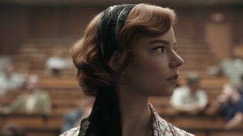 Movie still from “The Queen's Gambit” (2020), directed by Scott Frank – A person wearing a head scarf; Close Up shot, Low angle