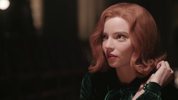 Movie still from “The Queen's Gambit” (2020), directed by Scott Frank – A person with red hair; Close Up shot, Over the shoulder angle
