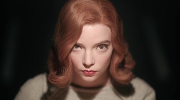Movie still from “The Queen's Gambit” (2020), directed by Scott Frank – A person with red hair; Close Up shot, High angle