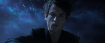 Movie still from “The Sandman” (2022), created by Neil Gaiman – A person in a dark room; Close Up shot, Low angle