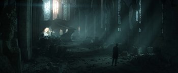 Movie still from “The Sandman” (2022), created by Neil Gaiman – A man standing in a room that has a lot of debris on the ground; Extreme Wide shot, Low angle
