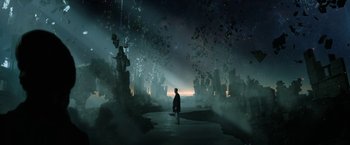 Movie still from “The Sandman” (2022), created by Neil Gaiman – A man standing in the middle of a forest at night; Extreme Wide shot, High angle