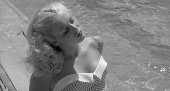 Movie still from “Raging Bull” (1980), directed by Martin Scorsese – A black and white photo of a woman in the water; Close Up shot, High angle