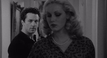 Movie still from “Raging Bull” (1980), directed by Martin Scorsese – A black and white photo of a man and a woman; Close Up shot, Over the shoulder angle