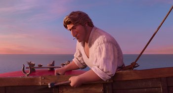 Movie still from “The Sea Beast” (2022), directed by Chris Williams – A man sitting on top of a wooden boat; Medium shot, Over the shoulder angle