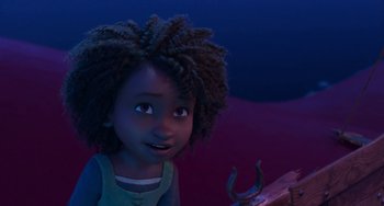 Movie still from “The Sea Beast” (2022), directed by Chris Williams – A young girl is standing next to an object in a dark room; Medium shot, High angle