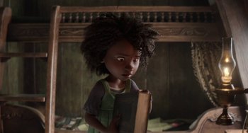 Movie still from “The Sea Beast” (2022), directed by Chris Williams – A child holding an old book in a room; Close Up shot, Over the shoulder angle