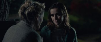 Movie still from “The Silence” (2019), directed by John R. Leonetti – A woman talking to another woman in the dark; Close Up shot, Over the shoulder angle