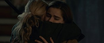 Movie still from “The Silence” (2019), directed by John R. Leonetti – Two women hugging each other in a dark room; Close Up shot, Over the shoulder angle