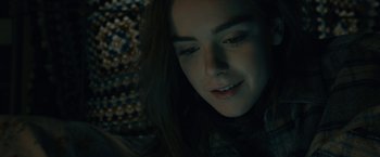 Movie still from “The Silence” (2019), directed by John R. Leonetti – A person with long hair; Close Up shot, Low angle