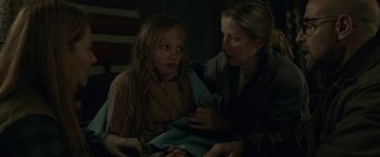 Movie still from “The Silence” (2019), directed by John R. Leonetti – A woman and a girl are looking at each other; Medium shot, Over the shoulder angle