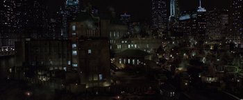 Movie still from “Batman Begins” (2005), directed by Christopher Nolan – A view of a city at night from above; Extreme Wide shot, High angle