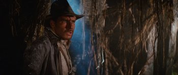 Movie still from “Raiders of the Lost Ark” (1981), directed by Steven Spielberg – A person wearing a cowboy hat; Close Up shot, Low angle