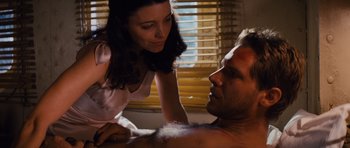 Movie still from “Raiders of the Lost Ark” (1981), directed by Steven Spielberg – A man and a woman are in a room; Close Up shot, Low angle