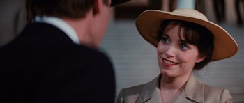 Movie still from “Raiders of the Lost Ark” (1981), directed by Steven Spielberg – A man and a woman talking to each other; Close Up shot, Over the shoulder angle