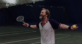 Movie still from “The Squid and the Whale” (2005), directed by Noah Baumbach – A man holding a tennis racquet on a tennis court; Medium shot, Low angle