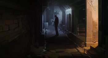 Movie still from “The Summit of the Gods” (2021), directed by Patrick Imbert – A man standing in a dark room looking at papers; Wide shot, Low angle