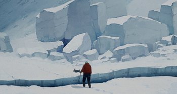 Movie still from “The Summit of the Gods” (2021), directed by Patrick Imbert – A man standing in the middle of a snow covered field; Extreme Wide shot, High angle