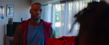 Movie still from “The Takedown” (2022), directed by Louis Leterrier – Close Up shot, Over the shoulder angle