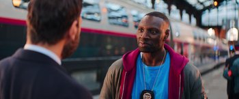 Movie still from “The Takedown” (2022), directed by Louis Leterrier – Medium shot, Over the shoulder angle