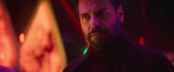 Movie still from “The Takedown” (2022), directed by Louis Leterrier – Close Up shot, Over the shoulder angle