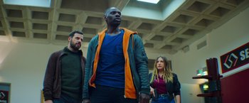 Movie still from “The Takedown” (2022), directed by Louis Leterrier – Medium shot, Low angle