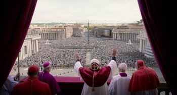 Movie still from “The Two Popes” (2019), directed by Fernando Meirelles – A crowd of people gathered in a large open area; Extreme Wide shot, High angle