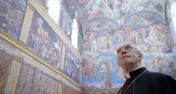 Movie still from “The Two Popes” (2019), directed by Fernando Meirelles – A man in a priest's outfit looking up at the ceiling of a church; Close Up shot, Over the shoulder angle