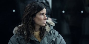 Movie still from “The Unforgivable” (2021), directed by Nora Fingscheidt – A person wearing a jacket; Close Up shot, Over the shoulder angle